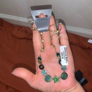 Reversible pilgrim necklace